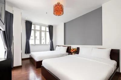 Family Room with Balcony and City View — A&A Toronto Hotel